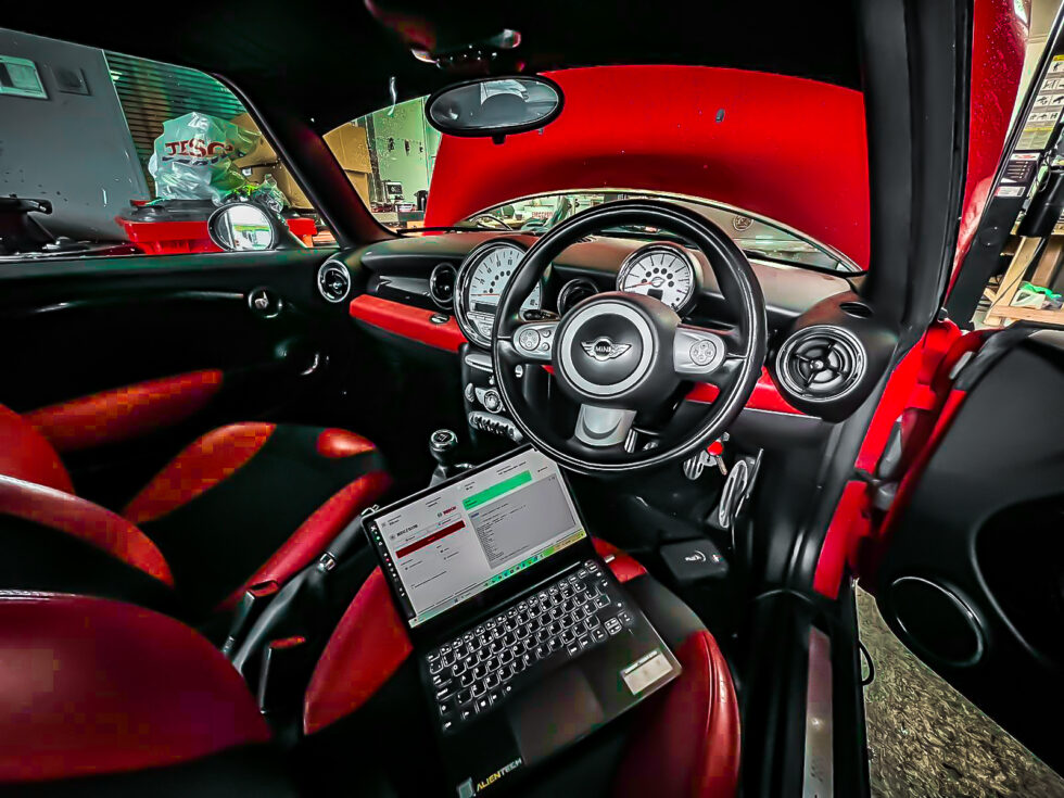 Technician connecting to ECU via OBD for Stage 1 calibration
